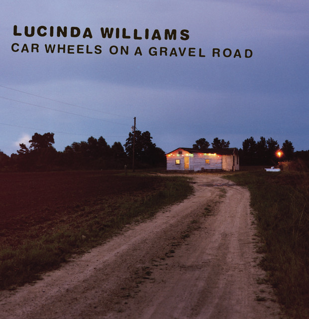 Car Wheels on a Gravel Road cover